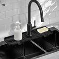 Meiliweser Silicone Faucet Mat for Kitchen Sink – Gen 3 10° Slope Splash Guard with Cuttable Hole – 14” x 5.5” Drip Catcher & Sponge Holder for Kitchen, Bathroom (Black)