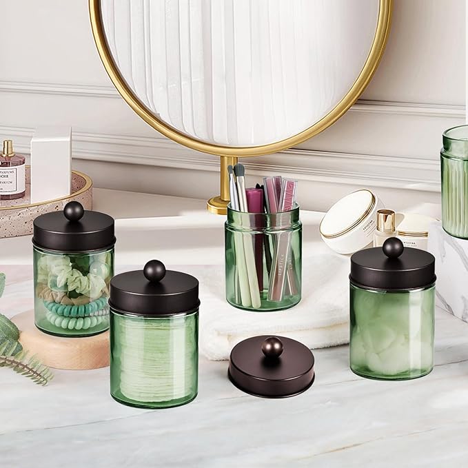 Amolliar Sage Green Apothecary Glass Jar With Metal Lid & Stickers, Bathroom Qtip Holder Storage Canister, Farmhouse Decor for Cotton Balls, Cotton Swabs, Makeup Pads, Bath Salt, Floss, Bronze 4 Pack