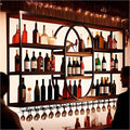 Large Wall Mount Wine Rack, Metal 4 Tier Large Capacity Hanging Bar Rack with Wine Glass Holder, Oval Wine Bottle Storage Display Rack for Kitchen, Living Room, Home (Black, 160cm/63in)